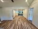 The spacious living room features modern wood flooring throughout the main living space at 1681 Stanton Sw Rd, Atlanta, GA 30311