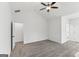 A spacious bedroom featuring plush carpet, light-colored walls, and ample natural light from the window at 3278 Greenhill Dr, Villa Rica, GA 30180