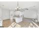 Modern kitchen with white cabinets, island, granite counters and modern lighting at 3278 Greenhill Dr, Villa Rica, GA 30180