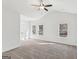 Large main bedroom with vaulted ceiling, carpet and natural light from three windows at 3278 Greenhill Dr, Villa Rica, GA 30180