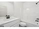 Bathroom features a white vanity, modern fixtures, and a tub-shower combination at 2279 Lakeview Pkwy, Villa Rica, GA 30180