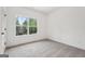 Bright bedroom with neutral carpet and a window offering natural light at 2279 Lakeview Pkwy, Villa Rica, GA 30180
