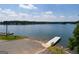 Scenic lake view featuring boat ramp, docks and lakefront homes in the background at 2279 Lakeview Pkwy, Villa Rica, GA 30180