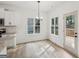 Dining area has plenty of natural light and leads to the kitchen and outdoor deck at 2279 Lakeview Pkwy, Villa Rica, GA 30180