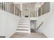 Open foyer with staircase, high ceilings, and hardwood floors at 2279 Lakeview Pkwy, Villa Rica, GA 30180