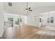 Open floorplan with hardwood floors, fireplace, and seamless transition between living spaces at 2279 Lakeview Pkwy, Villa Rica, GA 30180