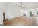Expansive living room featuring a stone fireplace, hardwood floors, and ample natural light at 2279 Lakeview Pkwy, Villa Rica, GA 30180
