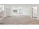 Large living room with staircase and ample natural light at 2279 Lakeview Pkwy, Villa Rica, GA 30180