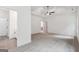 Spacious main bedroom boasts plush carpet, bright neutral paint, and tray ceilings at 2279 Lakeview Pkwy, Villa Rica, GA 30180