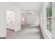 Large main bedroom with open ensuite bathroom, carpeted floor, and bright light at 2279 Lakeview Pkwy, Villa Rica, GA 30180