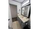 Bathroom with a neutral countertop, grey cabinets, and black hardware at 5526 Stoneleigh Court, Stone Mountain, GA 30088