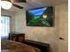 Bedroom with large TV, side tables, dresser, and a ceiling fan with light at 5526 Stoneleigh Court, Stone Mountain, GA 30088