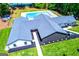 Aerial view showcasing the building's dark roof and landscaping, complemented by a well-maintained green lawn at 3279 Greenhill Dr, Villa Rica, GA 30180
