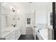 Modern bathroom featuring double vanity, soaking tub, and stylish fixtures at 3279 Greenhill Dr, Villa Rica, GA 30180