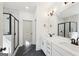 Modern bathroom featuring double sinks, a large shower, and sleek finishes at 3279 Greenhill Dr, Villa Rica, GA 30180