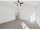 Bright and spacious bedroom with plush carpeting, a ceiling fan, and natural light at 3279 Greenhill Dr, Villa Rica, GA 30180