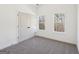 Cozy bedroom with natural light, neutral carpeting, and a spacious closet at 3279 Greenhill Dr, Villa Rica, GA 30180