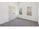 Cozy bedroom with natural light, neutral carpeting, and a spacious closet at 3279 Greenhill Dr, Villa Rica, GA 30180