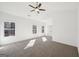 Bright bedroom with multiple windows, neutral carpeting, and a comfortable atmosphere at 3279 Greenhill Dr, Villa Rica, GA 30180