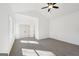 Spacious bedroom with plush carpeting, a ceiling fan, and ample natural light at 3279 Greenhill Dr, Villa Rica, GA 30180
