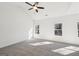 Spacious bedroom with large windows allowing ample natural light and plush carpeting at 3279 Greenhill Dr, Villa Rica, GA 30180