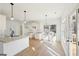 Modern kitchen with white cabinets, granite countertops, and stainless steel faucet at 3279 Greenhill Dr, Villa Rica, GA 30180