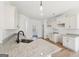 Kitchen with granite countertops, stainless steel sink, and hardwood floors at 3279 Greenhill Dr, Villa Rica, GA 30180