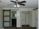 Bedroom with sliding closet doors and access to the bathroom at 3683 Brown Dr, Decatur, GA 30034