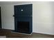 Living room featuring a black fireplace and freshly painted walls at 3683 Brown Dr, Decatur, GA 30034