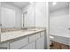 Contemporary bathroom with granite countertop sink and ample cabinet storage at 768 Great Oak Place # 26, Villa Rica, GA 30180