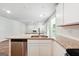 Kitchen with granite counters, stainless steel dishwasher, and sightlines to the living room at 768 Great Oak Place # 26, Villa Rica, GA 30180