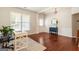 Stylish living room showcasing wood floors, a large window, and neutral decor with plenty of space at 169 Wallnut Hall Cir, Woodstock, GA 30189