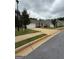 Charming single-story home featuring a well-maintained lawn and a convenient two-car garage at 170 Forray Dr, Covington, GA 30016