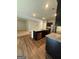 Open kitchen with modern appliances, granite countertops, and a center island at 170 Forray Dr, Covington, GA 30016