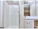 Bathroom with a shower stall, tiled vanity, and illuminated lighting at 5640 Terremont Cir, Norcross, GA 30093