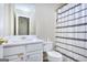 Bathroom featuring a white vanity, toilet, and a shower with a patterned curtain at 5640 Terremont Cir, Norcross, GA 30093