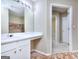 Bathroom featuring a long white vanity with seating area and a shower/tub combo at 5640 Terremont Cir, Norcross, GA 30093