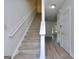 Bright entryway with a staircase and hardwood floors, offering a welcoming space at 5640 Terremont Cir, Norcross, GA 30093