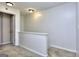 Upstairs hallway featuring neutral paint and carpeted floors at 5640 Terremont Cir, Norcross, GA 30093