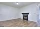 Spacious living room with hardwood floors and a black fireplace at 5640 Terremont Cir, Norcross, GA 30093