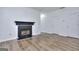 Living room showcasing the fireplace and modern flooring at 5640 Terremont Cir, Norcross, GA 30093