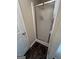 Bathroom with a standing shower and brown tiled floor at 11657 Flemming Ct, Hampton, GA 30228