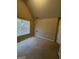 Bedroom with neutral color palette, carpeted floor, and large window for plenty of natural light at 11657 Flemming Ct, Hampton, GA 30228