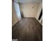Bedroom with new floors and waiting for new tenant's decorative vision at 11657 Flemming Ct, Hampton, GA 30228