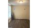 Bedroom with new hardwood flooring, ready for remodel and paint at 11657 Flemming Ct, Hampton, GA 30228