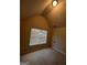 Bedroom with neutral color palette, carpeted floor, and large window for plenty of natural light at 11657 Flemming Ct, Hampton, GA 30228