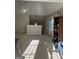 Large bonus room or loft area with vaulted ceiling, carpet, and natural light at 11657 Flemming Ct, Hampton, GA 30228