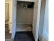 Walk-in closet with ample storage space and overhead shelf at 11657 Flemming Ct, Hampton, GA 30228