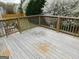 Wooden deck with railing, perfect for outdoor entertaining and backyard access at 11657 Flemming Ct, Hampton, GA 30228