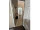 Inviting entryway with tiled floor, arched window above the front door, and staircase at 11657 Flemming Ct, Hampton, GA 30228